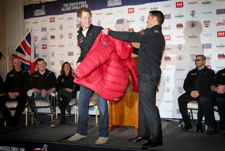 Image: Prince Harry is presented with a jacket by Inge Solheim