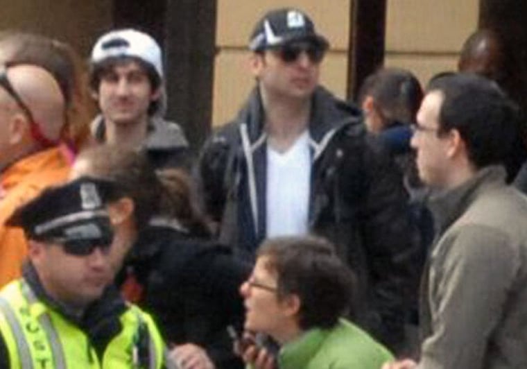 This Monday, April 15, 2013 photo provided by Bob Leonard shows second from left, Tamerlan Tsarnaev, who was dubbed Suspect No. 1 and third from left, Dzhokhar A. Tsarnaev, who was dubbed Suspect No. 2 in the Boston Marathon bombings by law enforcement. This image was taken approximately 10-20 minutes before the blast.