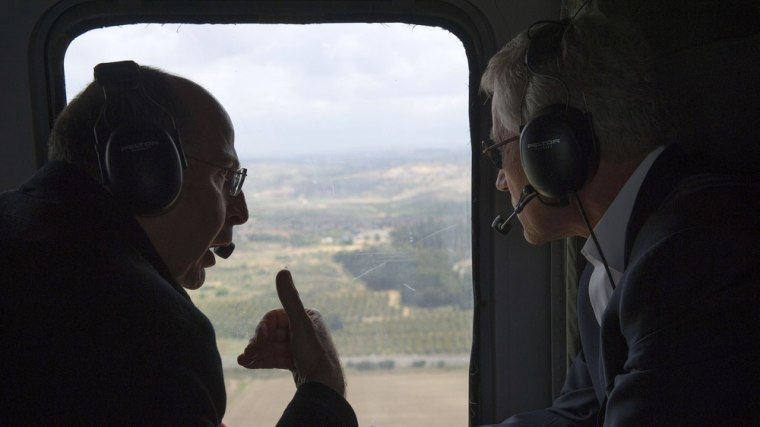 US Secretary of Defense Chuck Hagel and Israeli Minister of Defense Moshe Yaalon speak during a helicopter tour above the Golan Heights on April 22, 2013. Hagel met his counterpart to put the finishing touches on a major arms deal and for talks on Syria's civil war and the Iranian nuclear threat.
