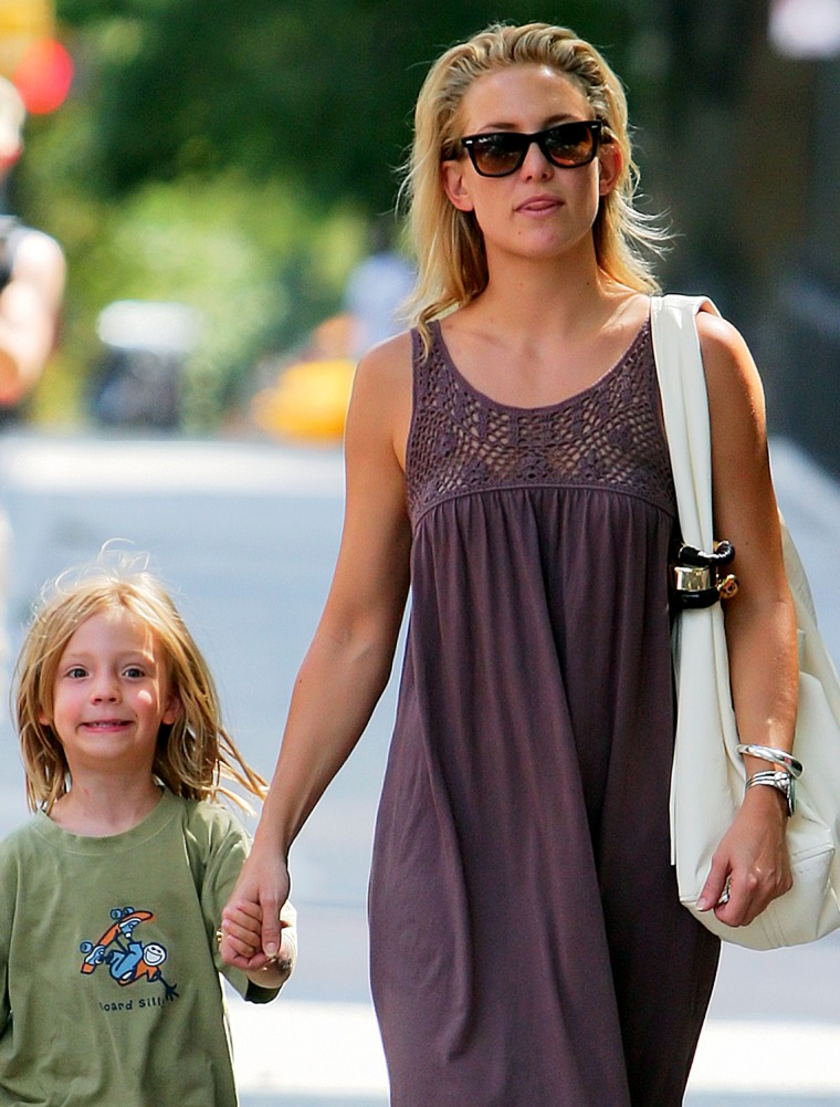 Kate Hudson says her son Ryder is being very protective during her pregnancy.