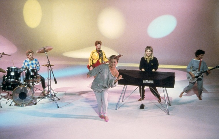 The Go-Go's, performing during a TV special in 1984, from left: Gina Schock, drums; Kathy Valentine, bass and lead guitar; Belinda Carlisle, lead vocals; Charlotte Caffey, keyboards; Jane Wiedlin, rhythm guitar.