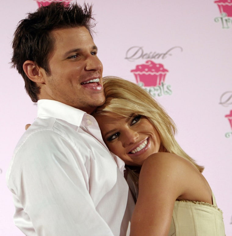 Nick Lachey and Jessica Simpson in 2005 ... a little closer than three tables apart. The two wed in 2002 and split in 2005.