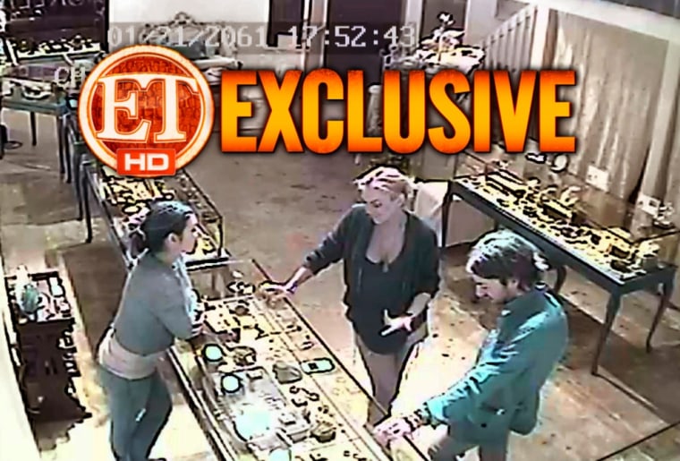 This image taken from video provided by Entertainment Tonight shows Lindsay Lohan, center, at Kamofie and Co. in Venice, Calif., on Jan. 21.