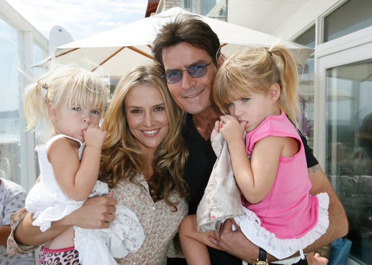 Charlie Sheen is pictured with his ex Brooke Meuller and his daughters with Denise Richards, Lola, left, and Sam, in Malibu, Calif., in August 2007.