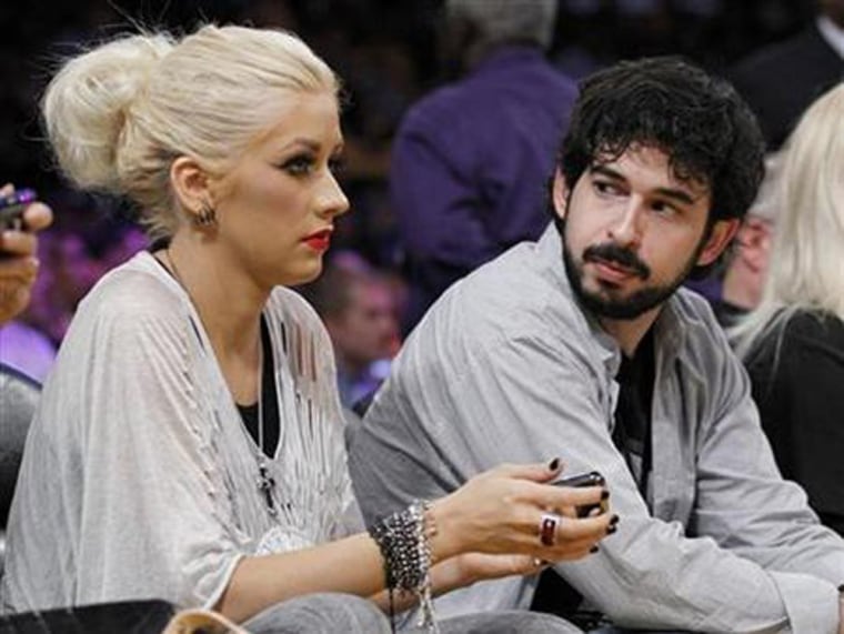 Christina Aguilera and Jordan Bratman in June during the NBA Finals.