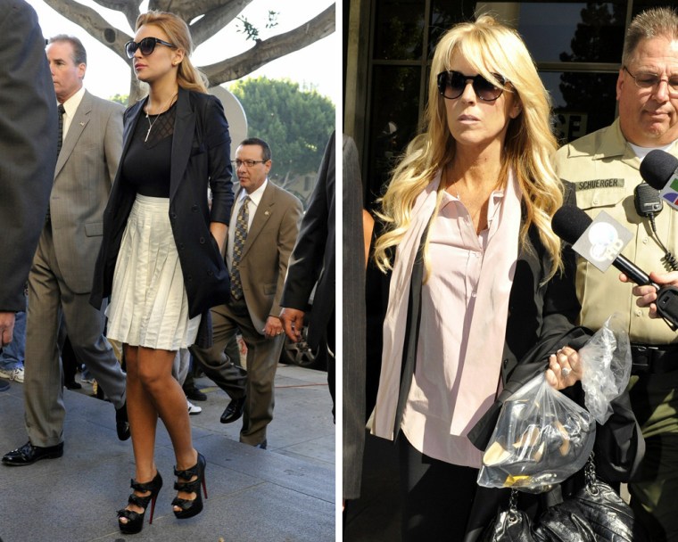 Lindsay Lohan, left, walks into court in high heels on Friday, and later, her mother Dina leaves with them in a bag.