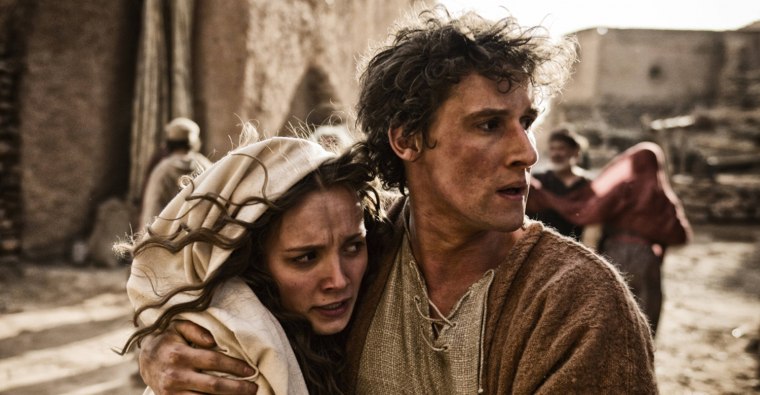 Joseph protects Mary in History's \"The Bible.\"