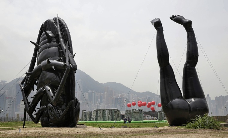 An inflatable sculpture called 'Falling into the Mundane World' by Tam Wai Pingon on display as part of the 'Inflation!' exhibition curated by Mobile M on April 24, in Hong Kong.