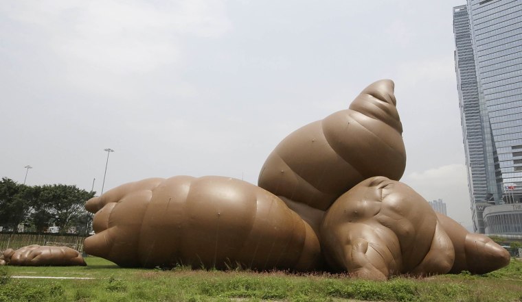 An inflatable sculpture called 'Complex Pile' by American contemporary artist Paul Mccarthy on display as part of the 'Inflation!' exhibition curated by Mobile M on April 24, 2013 in Hong Kong. The inflatable artwork is one of six on display as part of the exhibition which is open from April 25 until June 9.