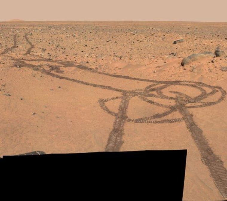 When some people look at this nine-year-old picture from NASA's Spirit rover, they see a vision of manhood, complete with testicles. Actually, it's standard operating procedure for making a turn on Mars.