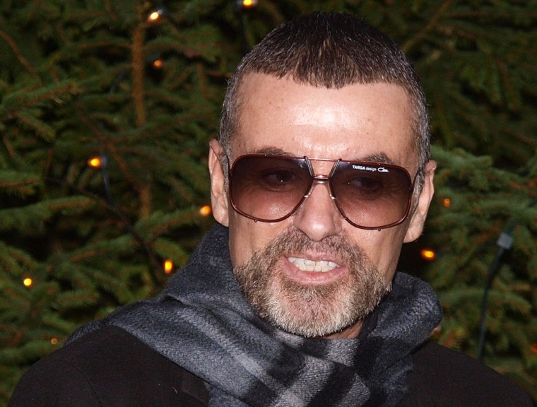 British singer George Michael talked about his recent illness outside his home in Hampstead in London on Dec. 23, 2011.