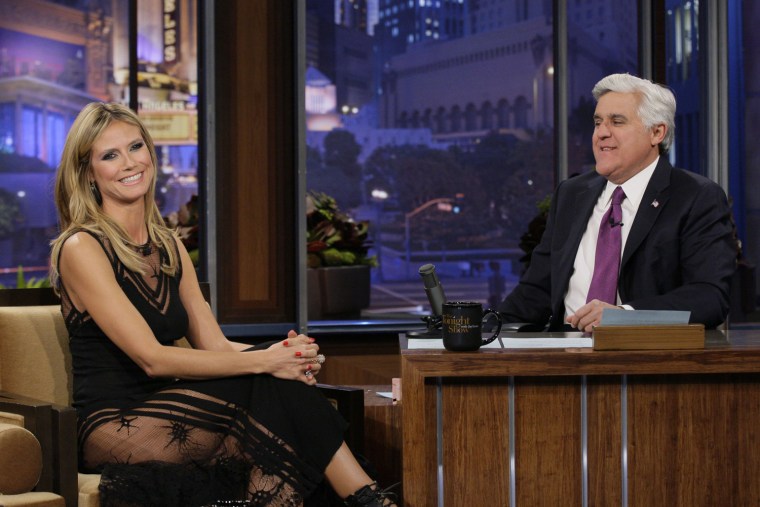 Supermodel Heidi Klum, 38, showed off her thighs while on The Tonight Show with host Jay Leno on January 23, 2013.