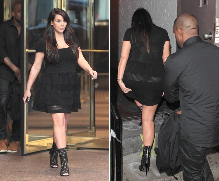 Kim Kardashian, donning a LBD, is seen with Kanye West in New York City on April 24, 2013.