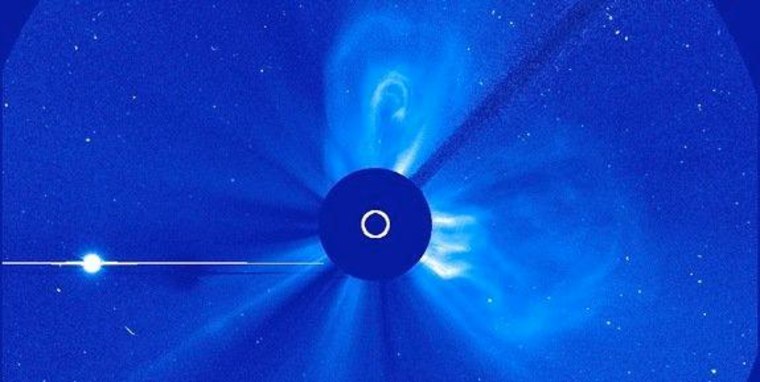 This image of a coronal mass ejection (CME) was captured on Saturday. The CME is headed in the direction of Mercury. The large bright spot on the left is Venus.