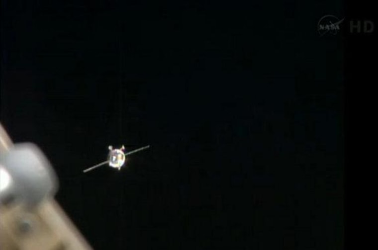 The Russian Progress 51 nears the International Space Station after a glitch involving a navigational antenna.