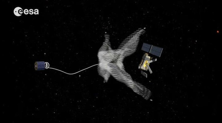 An artist's conception of a future mission that employs a net to capture a piece of space junk.