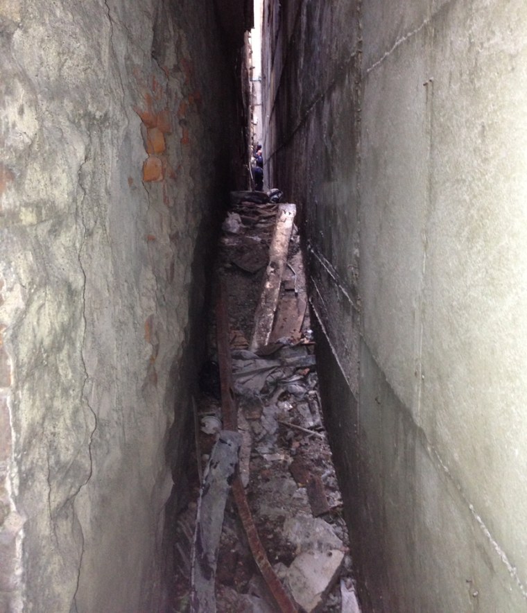The narrow alley in lower Manhattan where debris that might be pieces of landing gear from one of the commercial airliners destroyed on Sept. 11, 2001 was found.