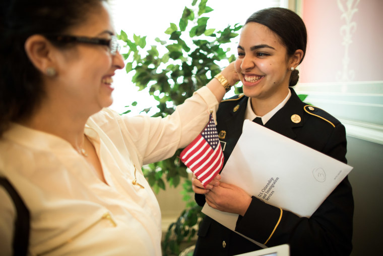 Oumama Kabli, right, celebrates with her mother, Sanaa Mandour, after becoming a U.S. citizen during a naturalization ceremony on Monday, April 15, at the Library of Congress in Washington, D.C.
