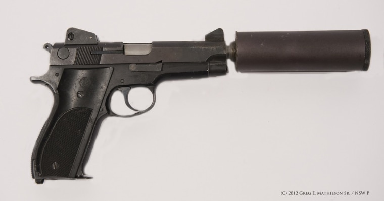 The first Hush Puppy pistol made exclusively for the U.S. Navy SEALs. The 9-mm pistol with sound suppressor was developed to quietly kill enemy guard dogs during night time operations in Vietnam.