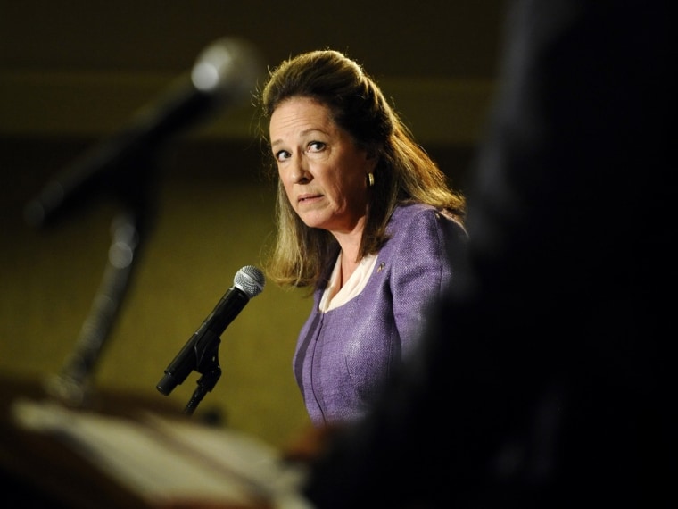 Democratic candidate Elizabeth Colbert Busch, left, looks at former South Carolina Gov. Mark Sanford as she answers a question during the 1st Congressional District debate on April 29 in Charleston, S.C.