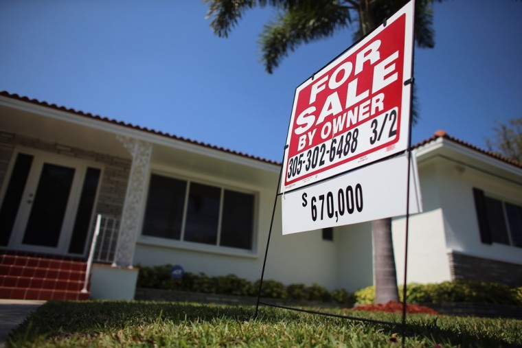 A for sale sign stands in front of a home on March 26, 2013 in Miami, Florida.