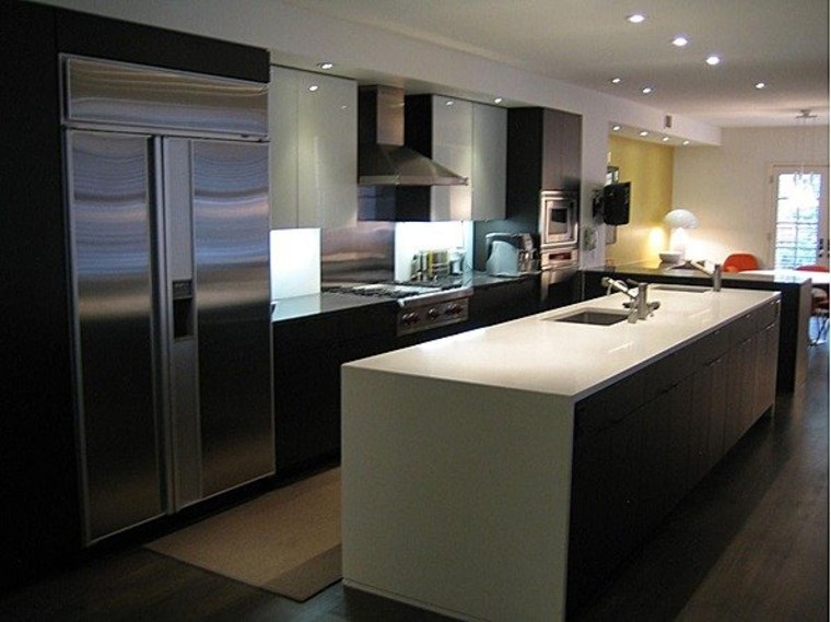 The kitchen has been completely redone in a contemporary style.