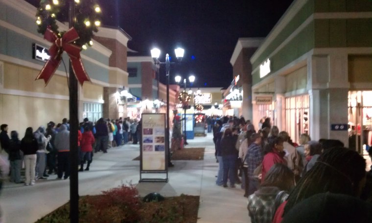 Orderly crowds at the Tanger Outlets in Mebane, N.C.