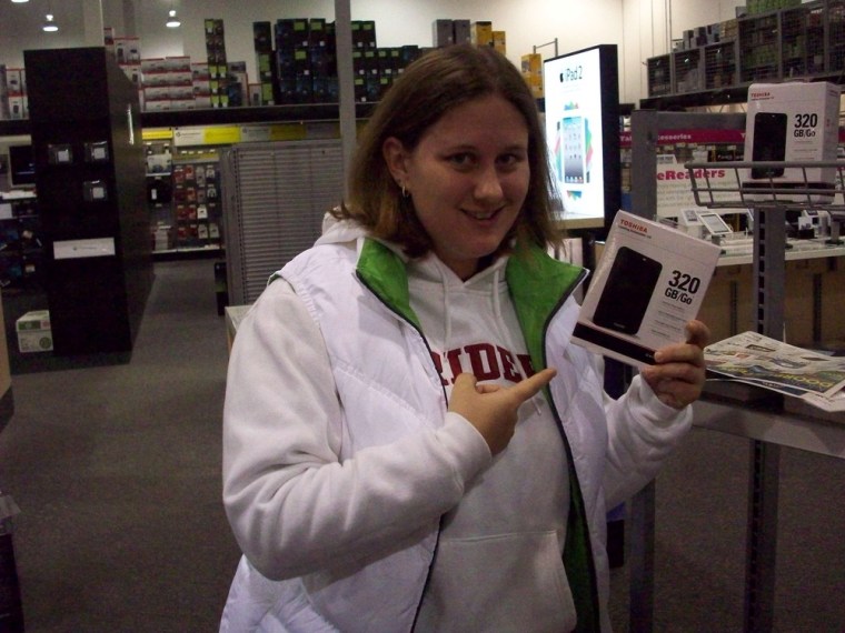 Erin Mellini with the hard drive for $30 she was able to snag.