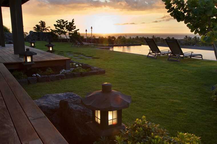 The pool overlooks the ocean.