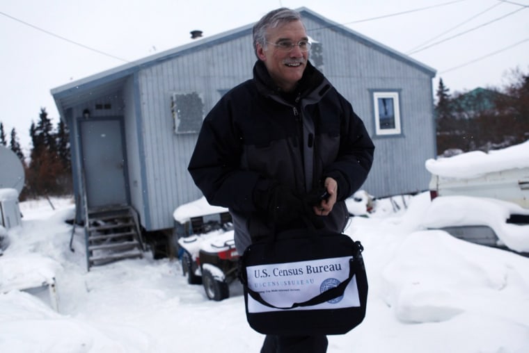 U.S. Census Bureau Director Robert Groves leaves the home of World War II veteran and village elder Clifton Jackson, 89, in the remote Inupiat Eskimo village Noorvik, Alaska.