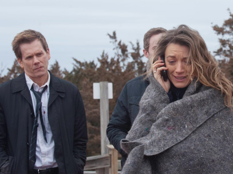 Ryan Hardy (Kevin Bacon) watches Claire (Natalie Zea) on the season finale of \"The Following.\"