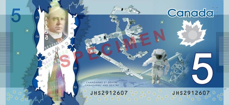 This rendition of the Canadian $5 bill shows Canadarm2 and DEXTRE in more detail. The bank note is to be issued in November.