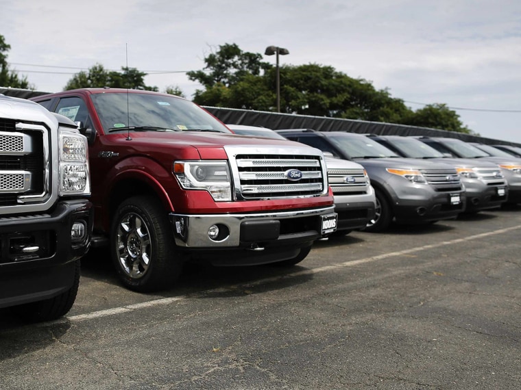 New Ford vehicles occupy the lot at Koons Ford dealership in Fairfax, Virginia, July 24, 2013. Ford Motor Co, maker of the top-selling F-150 pickup tr...