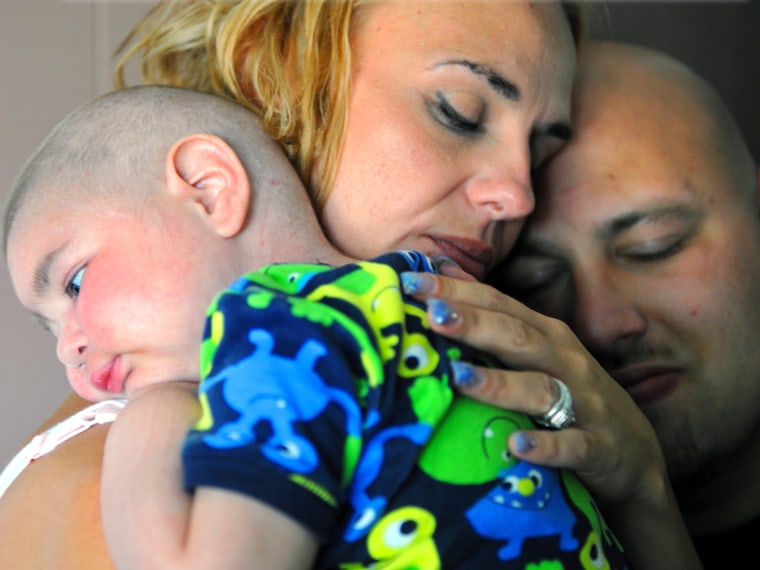Christine Swidorsky holds her terminally ill son, Logan.