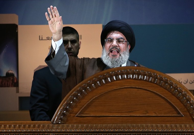 Hezbollah leader Sheik Hassan Nasrallah speaks during a rally to mark Jerusalem day or Al-Quds day, in a southern suburb of Beirut, Lebanon, on Aug. 2. The leader of Hezbollah made a rare public appearance Friday, pledging in a speech before thousands of supporters near the Lebanese capital that his militant group will continue fighting Israel and will never abandon Palestinians.