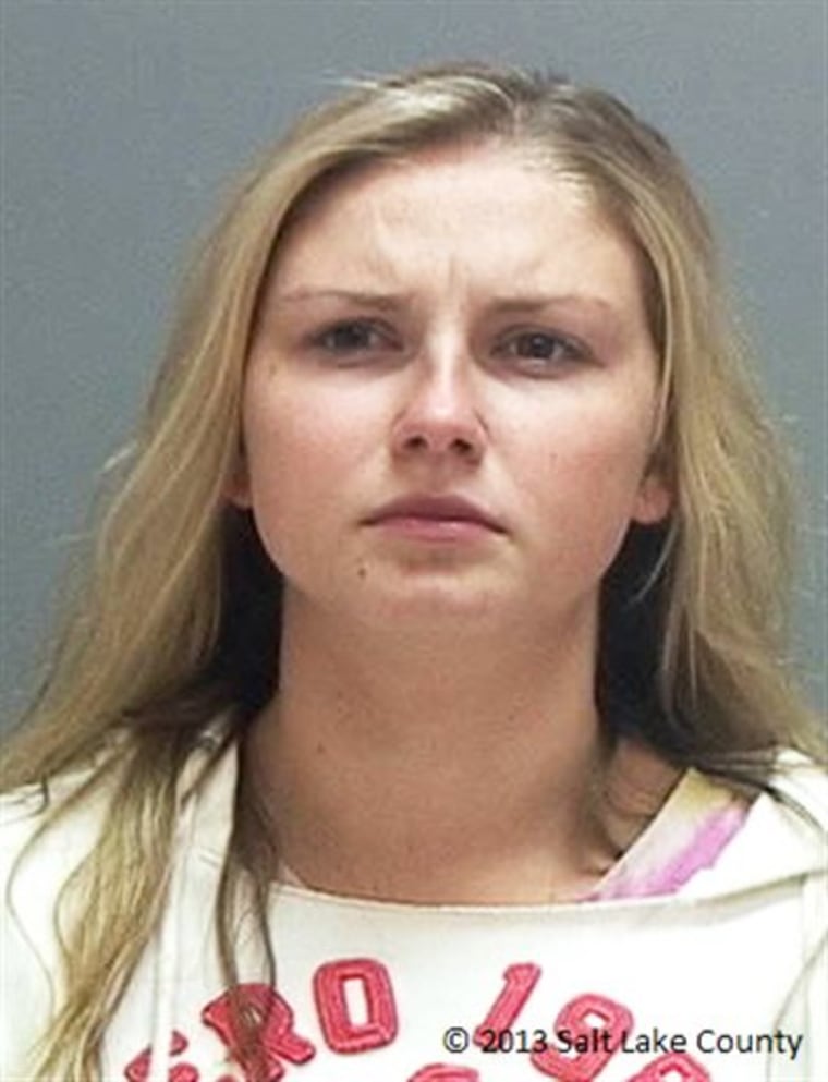 This photo released by the Salt Lake County Jail shows Kendra McKenzie Gill, who was arrested with three others on Saturday Aug. 3, 2013, after allege...