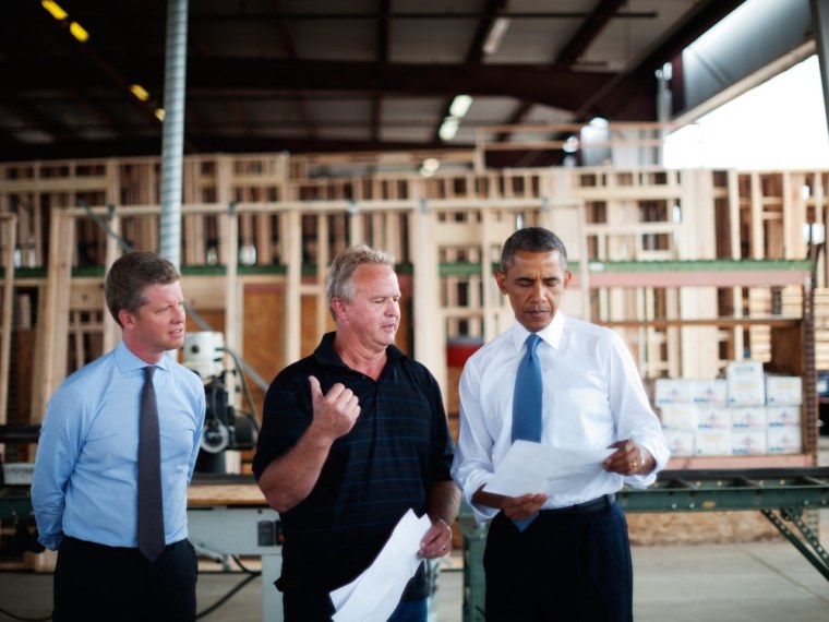 President Barack Obama and Housing Secretary Shaun Donovan tour Erickson Construction on August 6, 2013 in Chandler, Arizona.