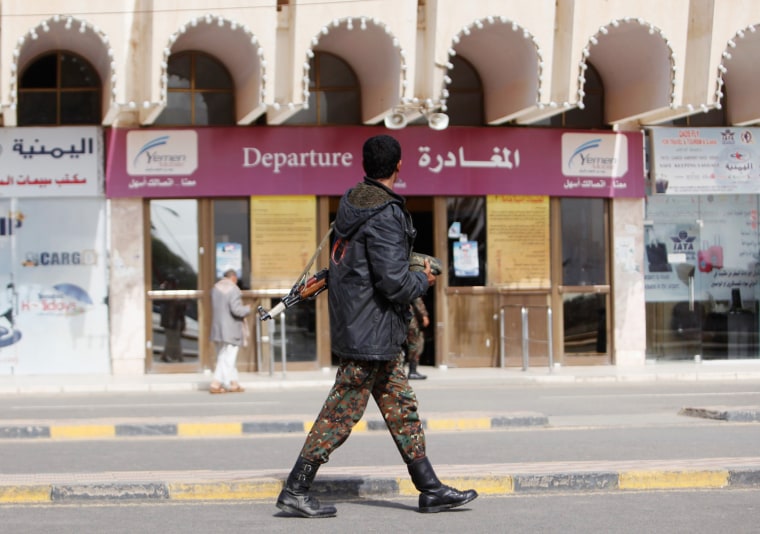 A police patrol outside Yemen's Sanaa International Airport, Wednesday