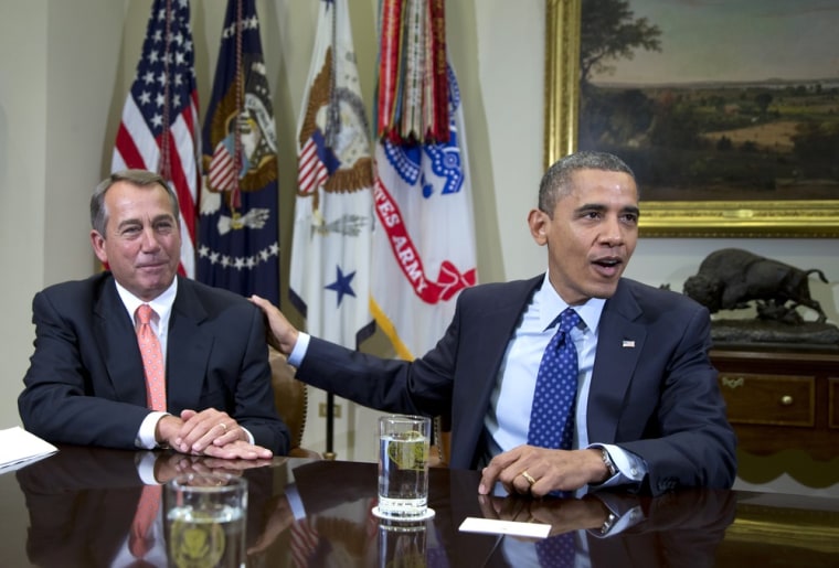 President Barack Obama acknowledges House Speaker John Boehner of Ohio while speaking to reporters in the Roosevelt Room of the White House in Washington, Friday, Nov. 16, 2012, as he hosted a meeting of the bipartisan, bicameral leadership of Congress to discuss the deficit and economy.