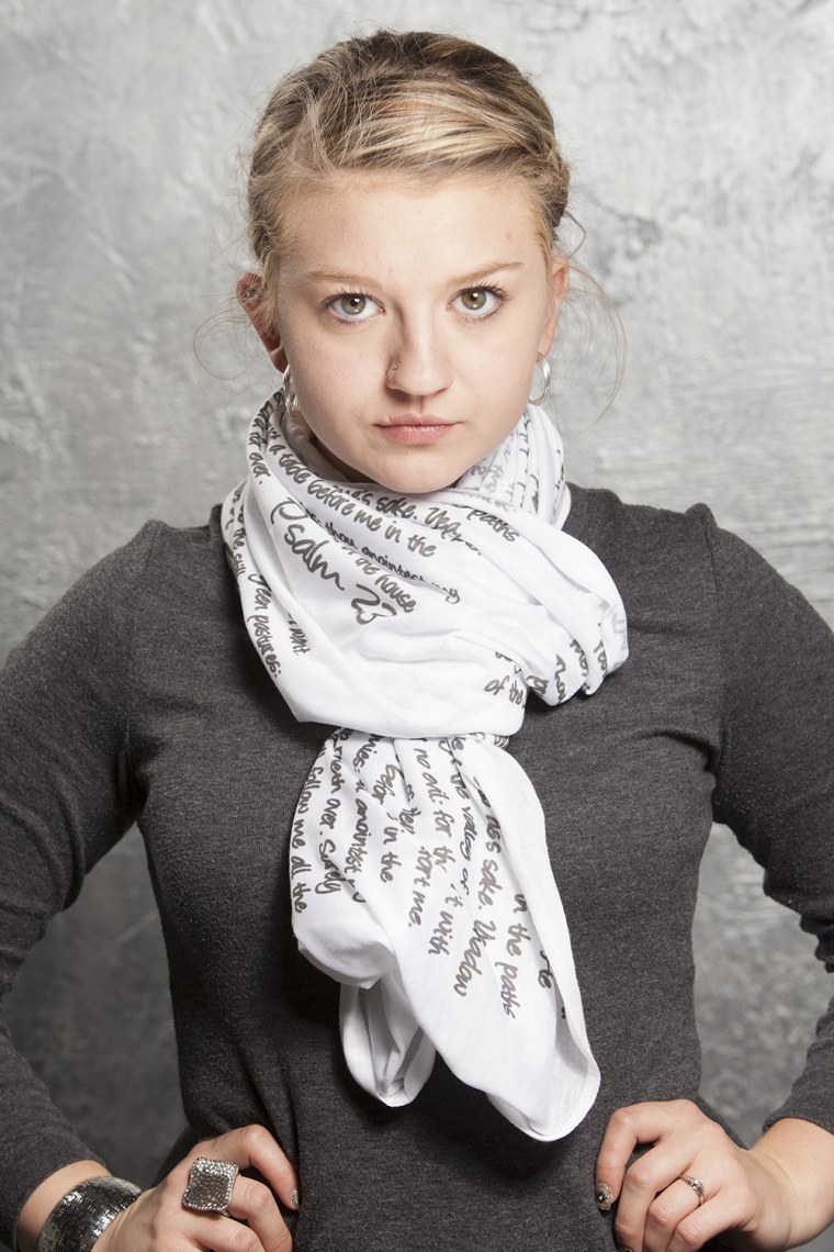 A model wears a scarf from the God Inspired Fashion collection.