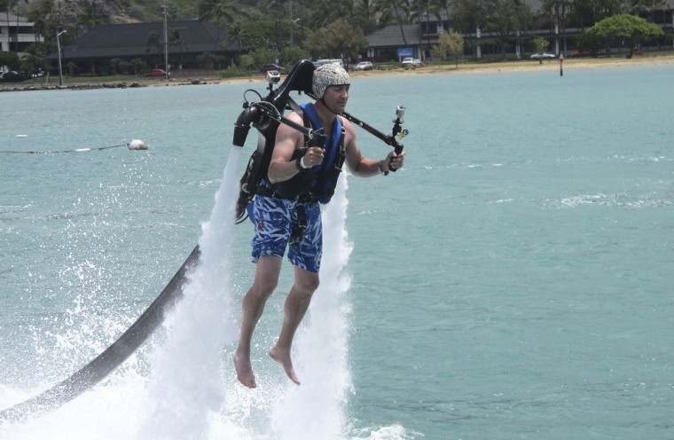 Customer Victor Verlage rides a Jetlev jetpack operated by the company H2O Water Sports Powered by Seabreeze in Honolulu last month.