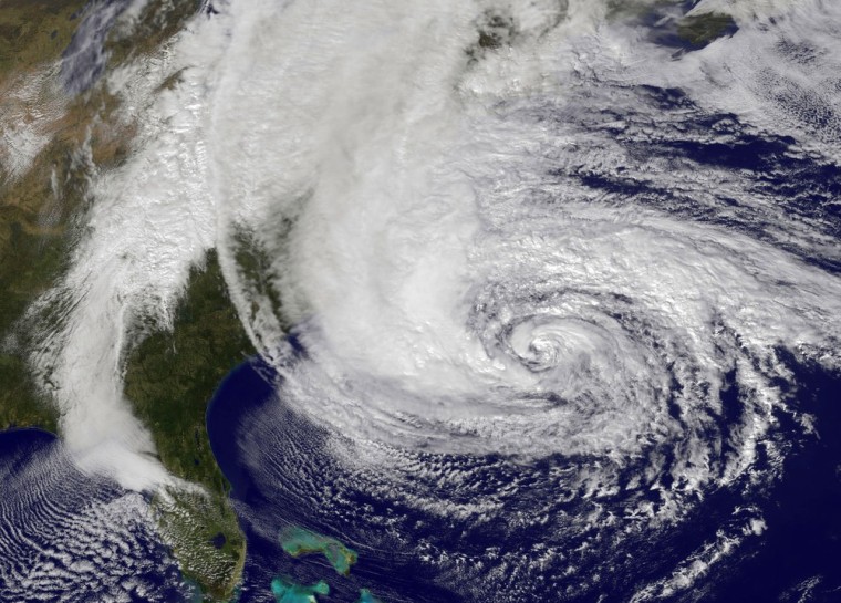 In a satellite image provided by NASA, Hurricane Sandy churns off the East Coast as it moves north on Oct. 28 in the Atlantic Ocean.