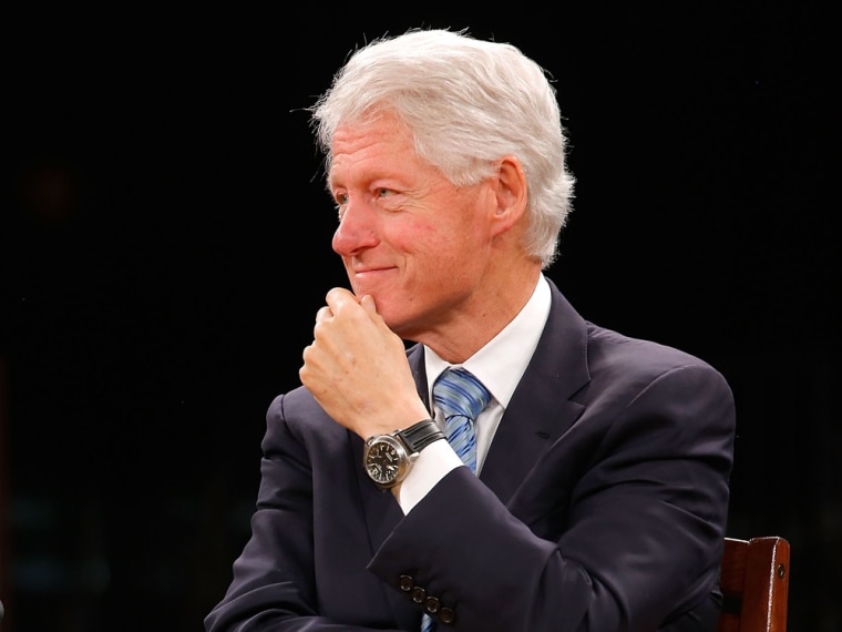 President and founder of the Clinton Foundation Bill Clinton appears onstage during the 'Embrace Tomorrow - A Conversation Without Borders' program hosted in conjunction with the Nelson Mandela Foundation at the Pretoria Parade Grounds on August 7, 2013 in Pretoria, South Africa.