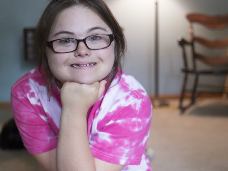 Rachel Mast, 14,  poses for a portrait at home in Olathe, KS, Aug. 6, 2013. Rachel has Downs Syndrome.