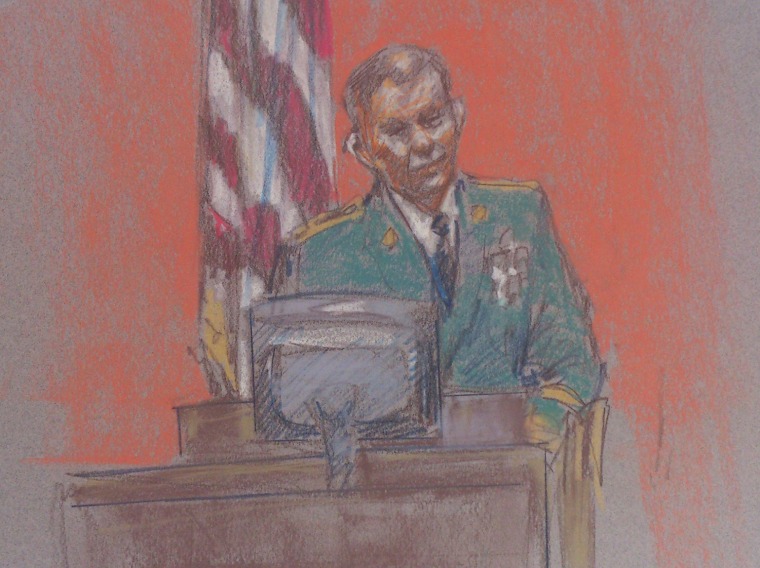 Staff Sgt. Michael Davis, who survived the November 2009 Fort Hood massacre, takes the stand during Nidal Hasan's trial on Thursday, Aug. 8, 2013.
