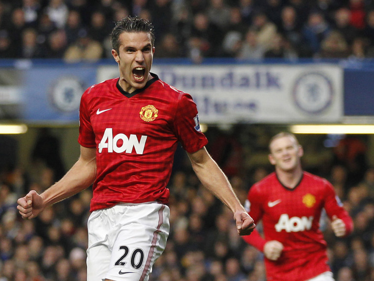 Manchester United's Dutch player Robin van Persie celebrates scoring their second goal during the English Premier League soccer match between Chelsea ...
