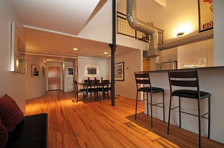 Measuring 2,000 square feet, the condo has 2 bedrooms, 2 baths and a private rooftop deck.