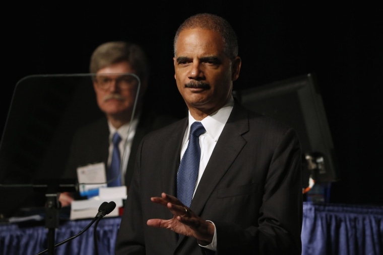U.S. Attorney General Eric Holder speaks on stage during the annual meeting of the American Bar Association in San Francisco, California August 12, 2013. The U.S. Justice Department plans to change how it prosecutes some non-violent drug offenders, ending a policy of mandatory minimum prison sentences, in an overhaul of federal prison policy that Holder will unveil on Monday. REUTERS/Stephen Lam (UNITED STATES - Tags: CRIME LAW DRUGS SOCIETY)