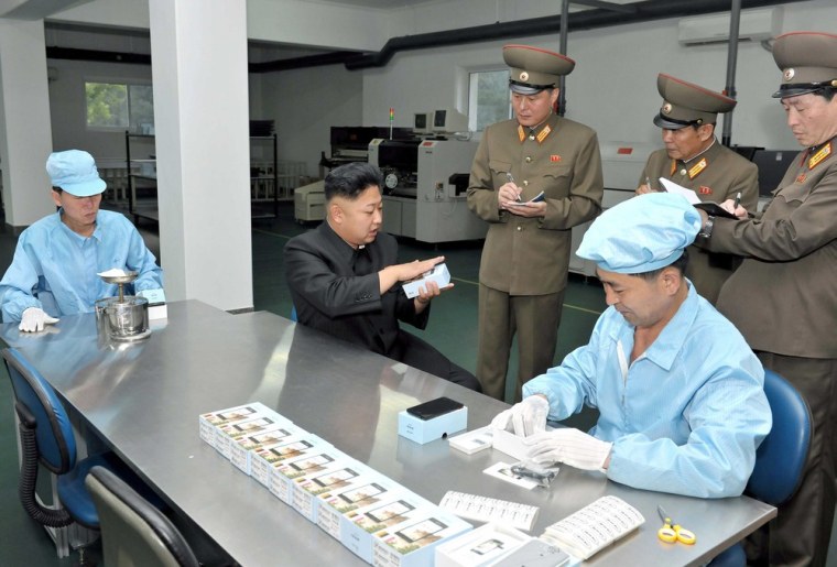North Korean leader Kim Jong-Un visits the May 11 Factory in this undated photo released by North Korea's Korean Central News Agency (KCNA) in Pyongya...
