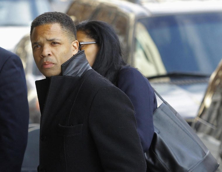 Former Chicago congressman Jesse Jackson Jr. enters the U.S. District Federal Courthouse in Washington February 20, 2013. Jackson, son of the famed civil rights leader, plans to plead guilty to charges filed on 15 February accusing him of misusing $750,000 in campaign funds, his attorney said.